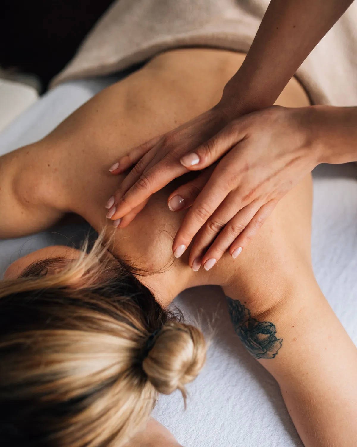 Portrait of a client receiving a body therapy treatment